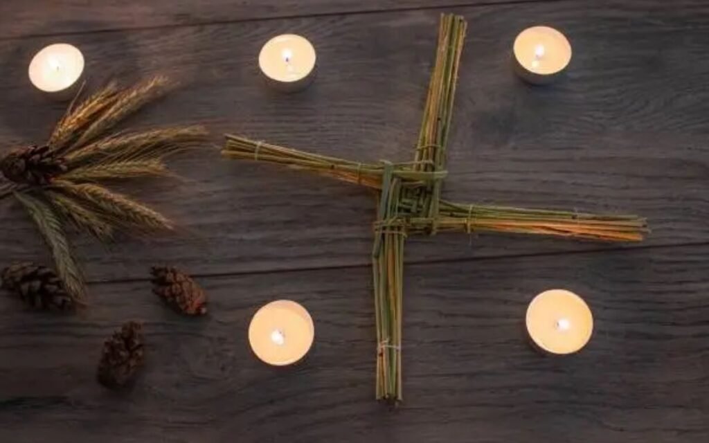 St. Brigid's cross surrounded by five candles